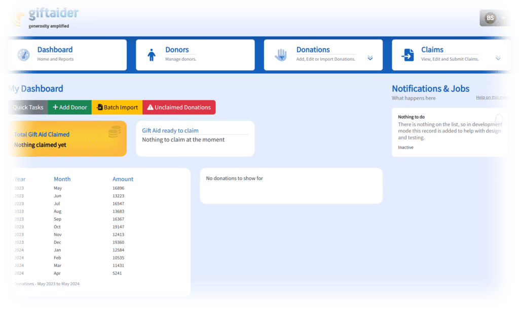 Screenshot of GiftAider charity management software dashboard displaying features such as donor management, donation import, Gift Aid claims, and notifications for charity CRM systems.